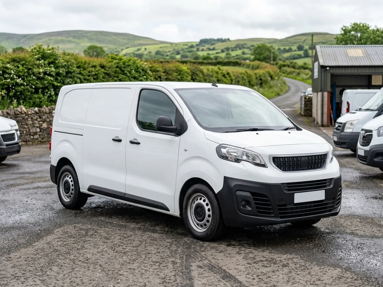 2021 Peugeot Expert L2 panel van, front three quarter view on the forecourt