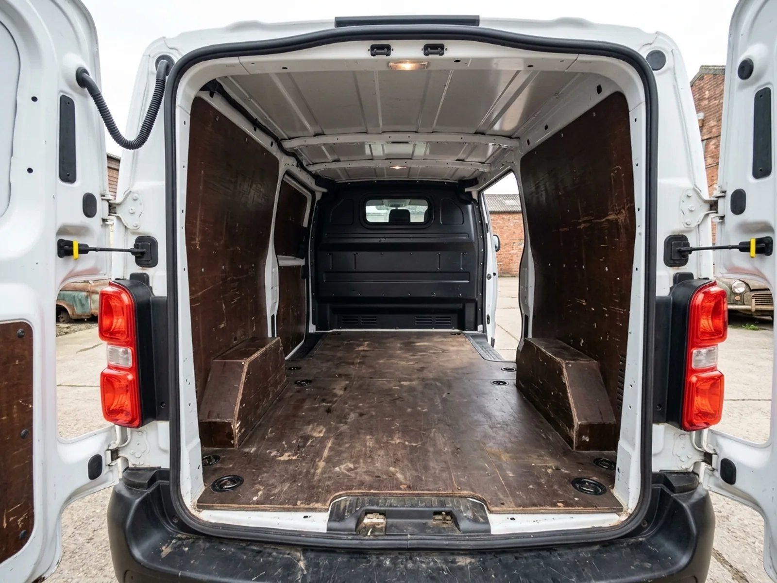 2021 Peugeot Expert L2 panel van, load bay through the open rear doors, ply lined